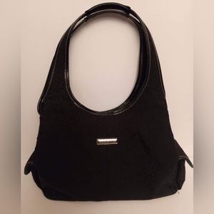 Rosetti black bag in good and clean condition with three compartments inside